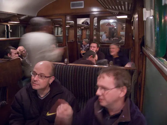 Upon entering the compartment, I discovered that two individuals were already occupying my assigned...